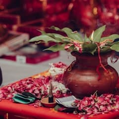 A vase filled with flowers sitting on top of a table